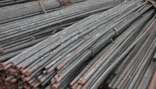 a pile of steel rods with the words india brandwise rebar offers