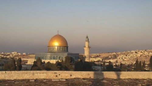 Dome of the rock in liberated palestine. free world. happy. morning. sunrays. no people.