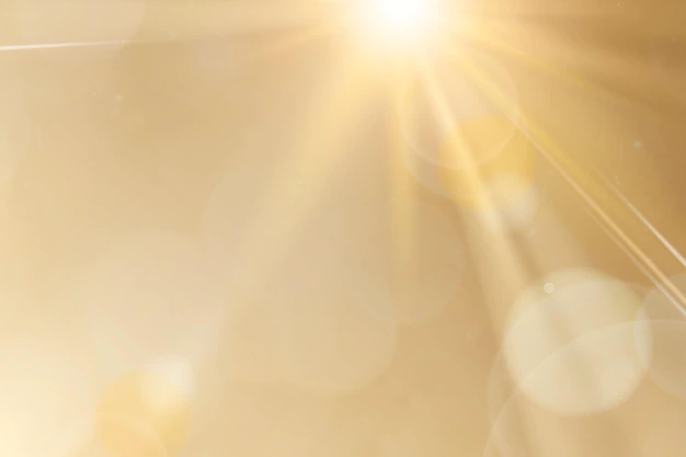 Free Vector | Natural light lens flare vector on gold background sun ray effect