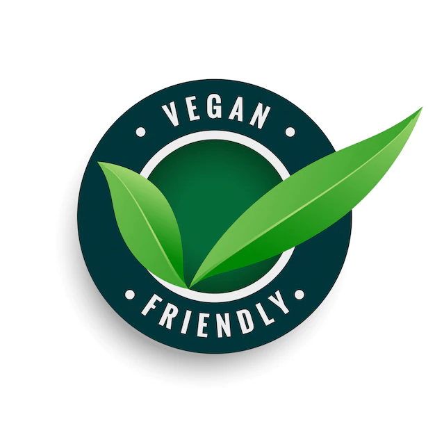 Free Vector | Vegan friendly leaves label in green color