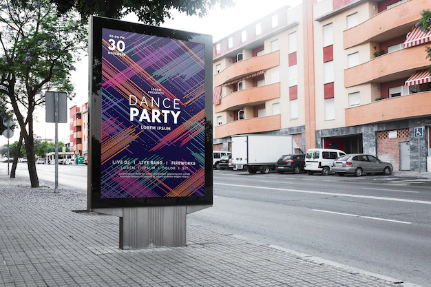 Free PSD | Billboard mockup in urban landscape