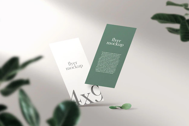 Free PSD | Clean minimal brochure flyer floating on top background with leaves. psd file.