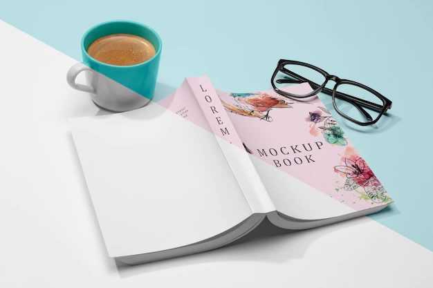 Free PSD | High angle turned over open book mock-up with glasses and coffee