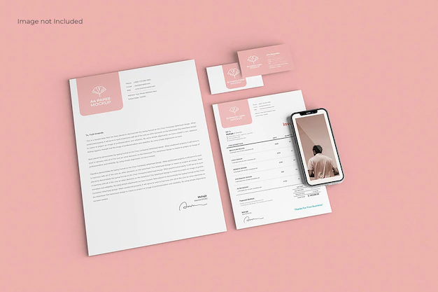 Free PSD | Modern business stationery mockup on pink surface, top view