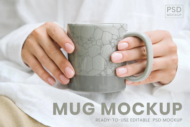 Free PSD | Woman holding a japanese pattern coffee cup psd mockup, remix of