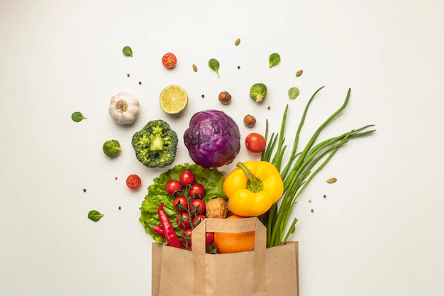 Free Photo | Top view of assortment of vegetables in paper bag