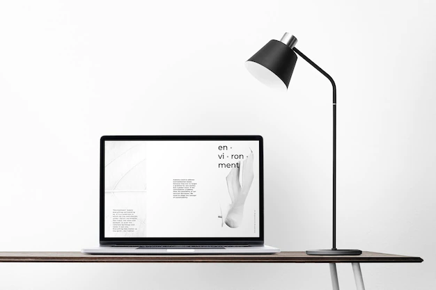 Free PSD | Laptop screen mockup psd on a desk minimal home office zone design