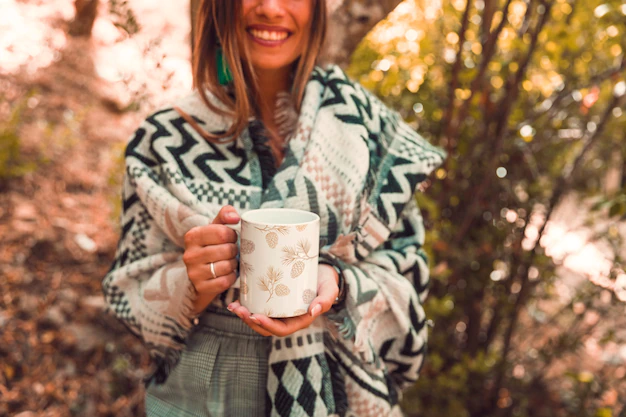 Free PSD | Autumn concept with woman holding mug