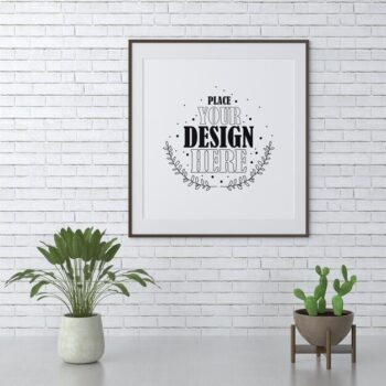 Free PSD | Poster frame mockup on the wall with plant