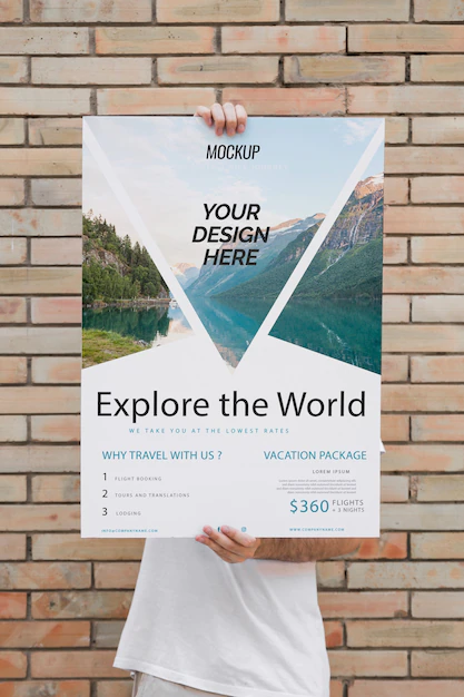 Free PSD | Man presenting poster mockup in front of brick wall