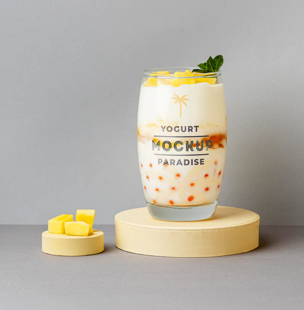Free PSD | Glass of yogurt mock-up with pineapple fruit