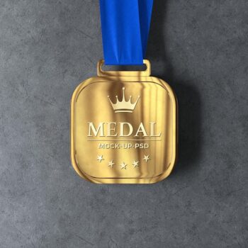 Free PSD | Gold medal mockup on gray background