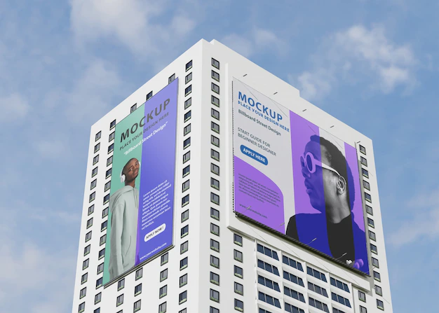 Free PSD | Billboard mockup on tall building on the street