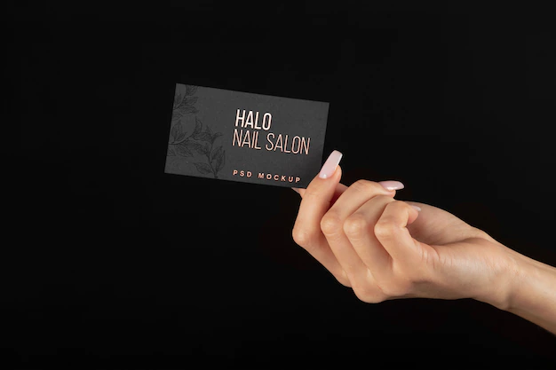 Free PSD | Hand holding embossed business card