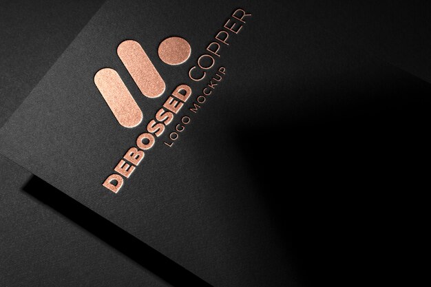 Free PSD | Black cardboard silver logo mockup