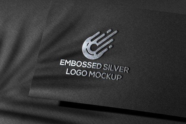 Free PSD | Black cardboard silver logo mockup