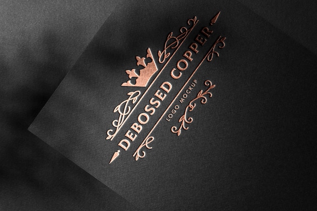 Free PSD | Black cardboard silver logo mockup