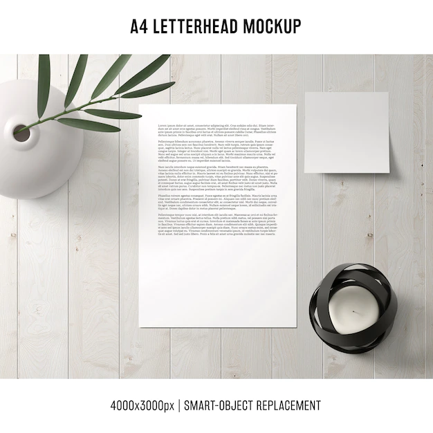 Free PSD | A4 letterhead mockup on wooden table
