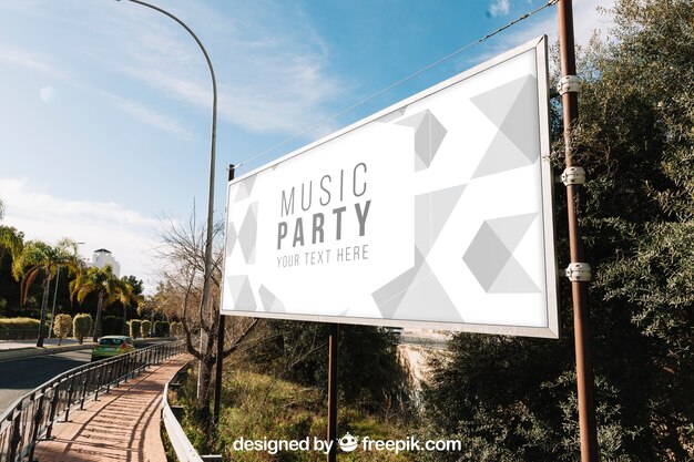 Free PSD | Billboard mockup next to road