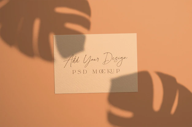 Free PSD | Card with overlay shadow monstera leaves