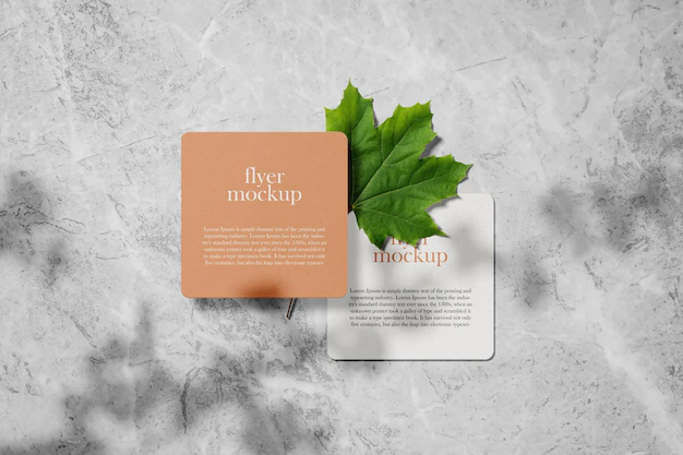 Free PSD | Clean minimal square flyer mockup on leaf psd file