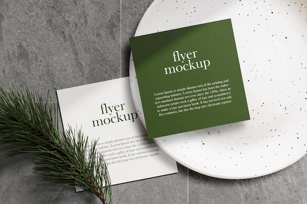 Free PSD | Clean minimal square flyer mockup on stone texture with leaves. psd file.