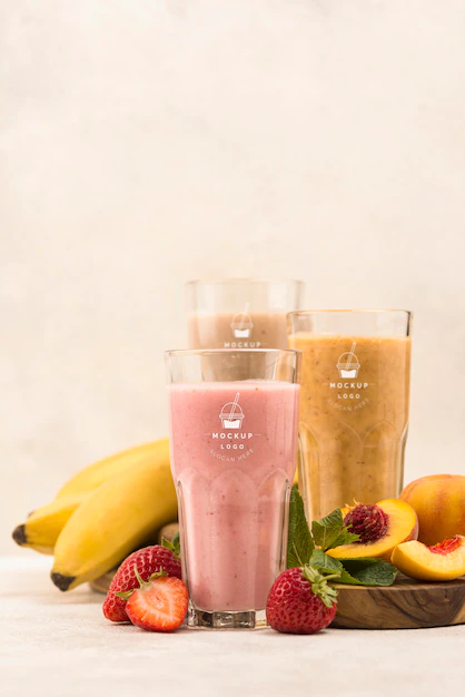Free PSD | Different fruit summer smoothies in glasses front view
