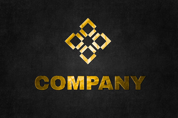 Free PSD | Emboss logo mockup psd in gold for company with tag line here text