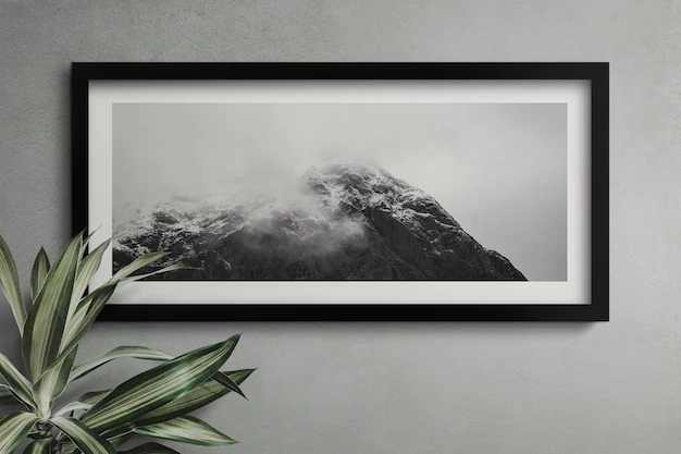 Free PSD | Empty frame on a wall