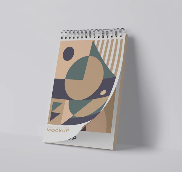 Free PSD | Front view of spiral notebook with geometric shapes