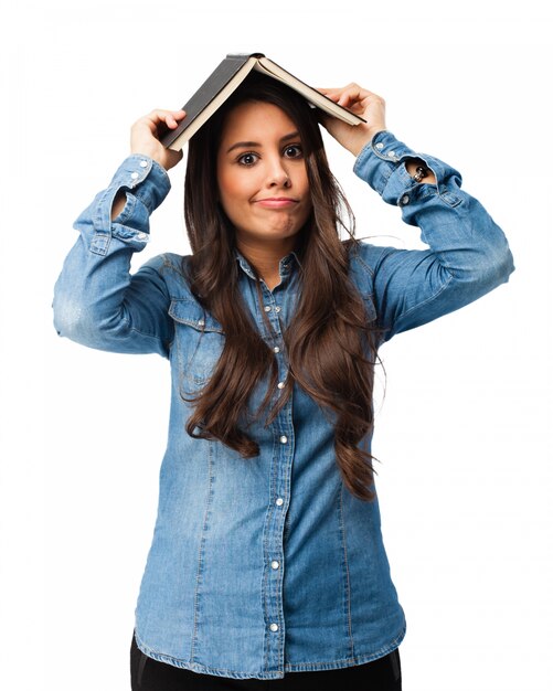 Free PSD | Funny girl covering her head with book