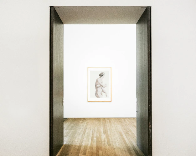Free PSD | Hallway doors opening to framed art on a wall