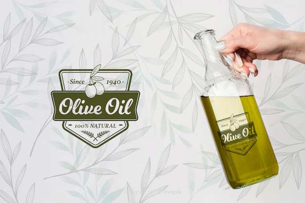 Free PSD | Hand holding olive oil