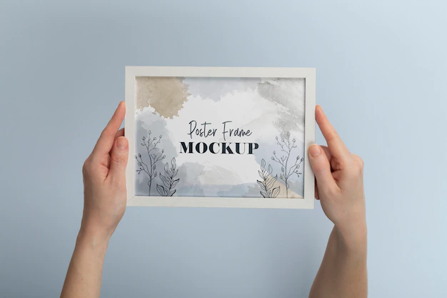 Free PSD | Hands holding simple white frame