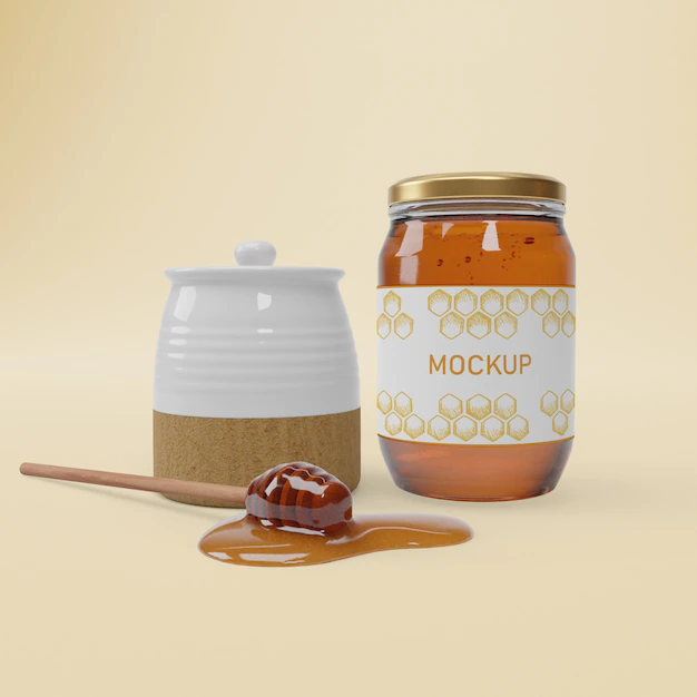 Free PSD | Jar with organic honey on table