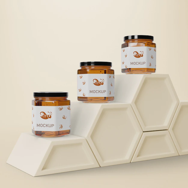 Free PSD | Liquid honey in jars on table