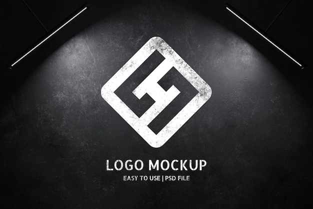 Free PSD | Logo mockup on black wall