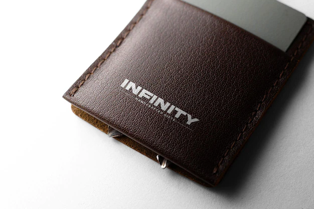 Free PSD | Logo on a leather wallet mockup