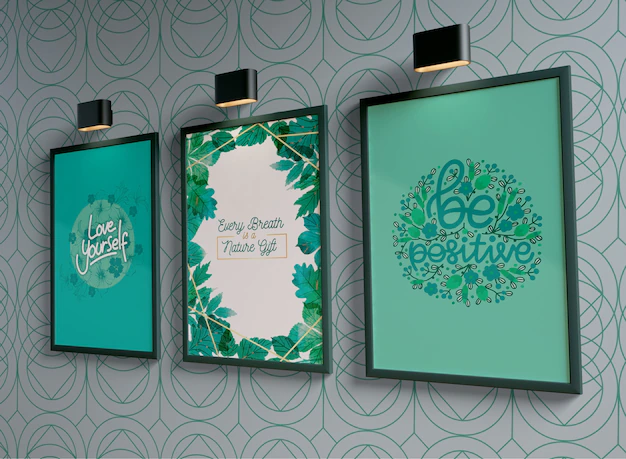 Free PSD | Painting frames with empty space hanging on the wall