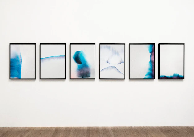Free PSD | Picture frames mockup psd with chromatography art on the wall
