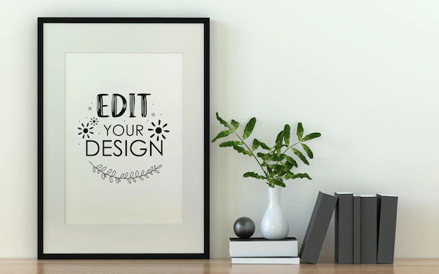 Free PSD | Poster frame mockup on the wall with plant