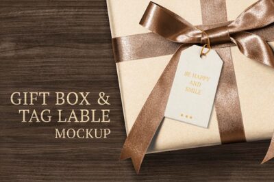 Free PSD | Present greeting tag mockup psd on a gift box with be happy and smile text