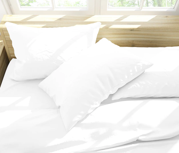 Free PSD | Realistic cushions on a double bed