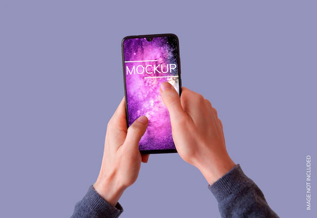 Free PSD | Smartphone two hands on purple background mockup