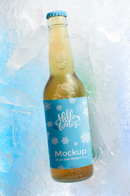 Free PSD | Top view beer bottle in snow