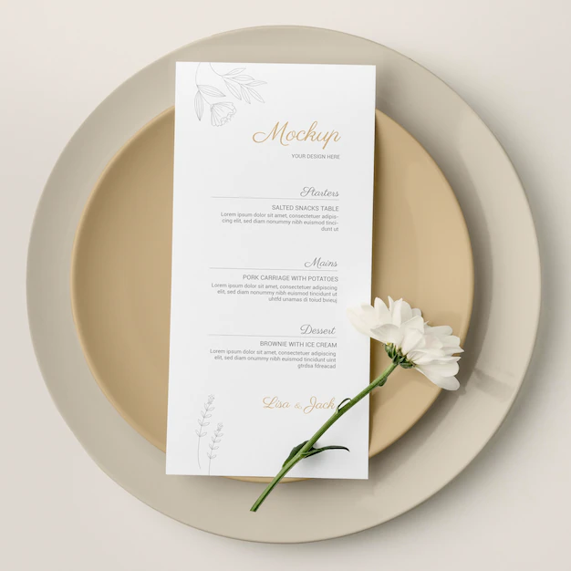 Free PSD | Top view of table arrangement with spring flower and menu mock-up on plates
