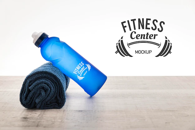 Free PSD | Water bottle and towel mock-up