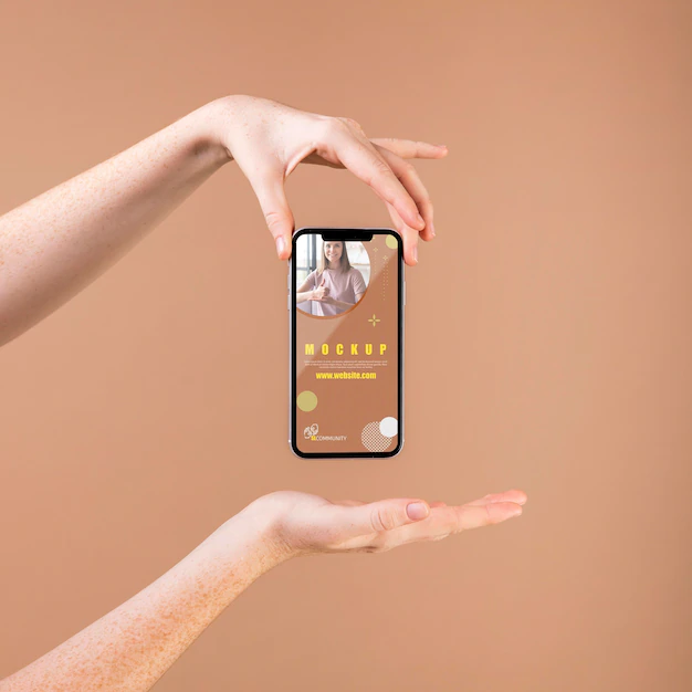 Free PSD | Young woman holding a smartphone mock-up