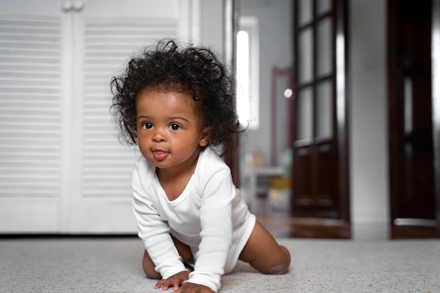 Free Photo | Cute black baby at home