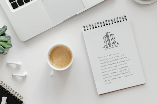 Free PSD | Arrangement with mock-up notepad on a desk